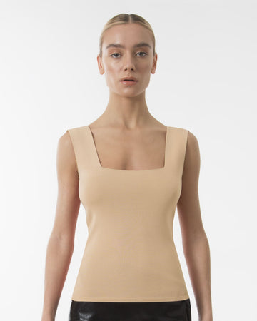 The beige sleeveless top blouse