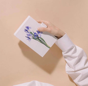 White floral wooden clutch