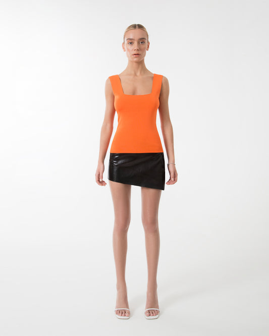 The orange sleeveless top blouse